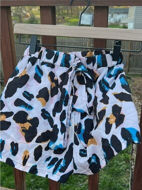 SHEIN White Shorts with Black, Blue & Gold Spot Print